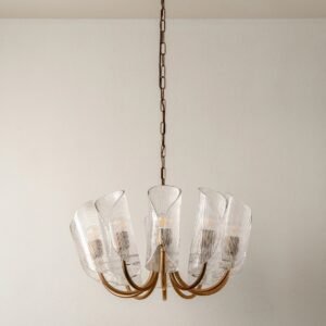 Cannoli - 10 light aged brass and textured glass chandelier